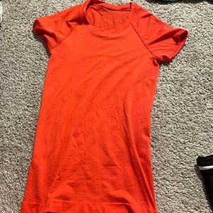 Red Lululemon Swiftly Tech short sleeve